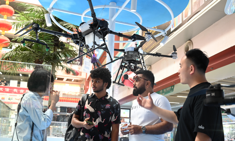 Overseas merchants inquire about drone procurement at Yiwu International Trade City in Yiwu, East China’s Zhejiang Province. Photo: Courtesy of Yiwu International Trade City