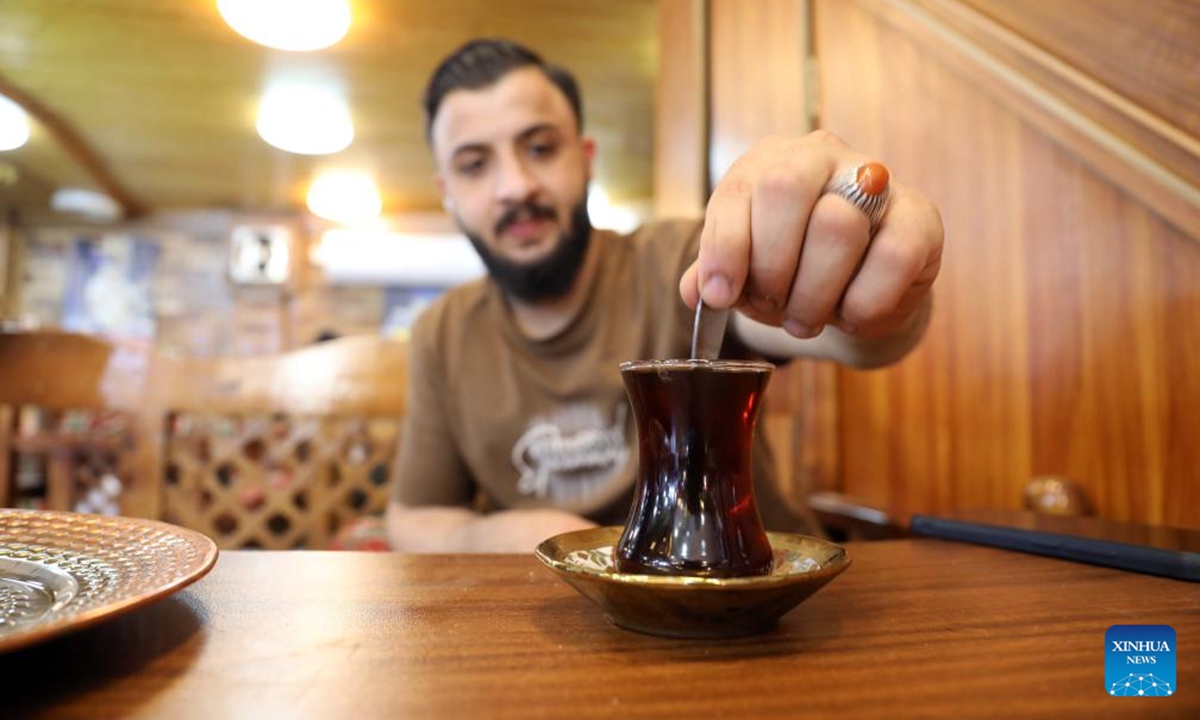 A man drinks tea at a teahouse in Baghdad, Iraq, on May 21, 2026. International Tea Day is observed on May 21 annually. (Xinhua/Khalil Dawood)