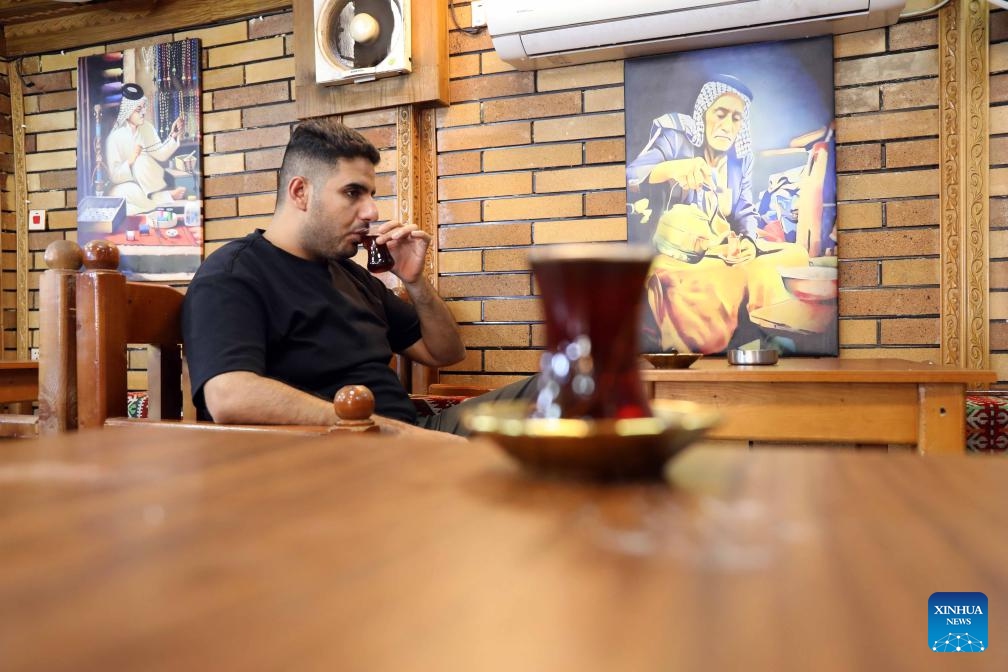 A man drinks tea at a teahouse in Baghdad, Iraq, on May 21, 2026. International Tea Day is observed on May 21 annually. (Xinhua/Khalil Dawood)