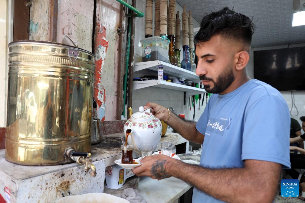 A teahouse worker makes local black tea in Baghdad, Iraq, on May 21, 2026. International Tea Day is observed on May 21 annually. (Xinhua/Khalil Dawood)