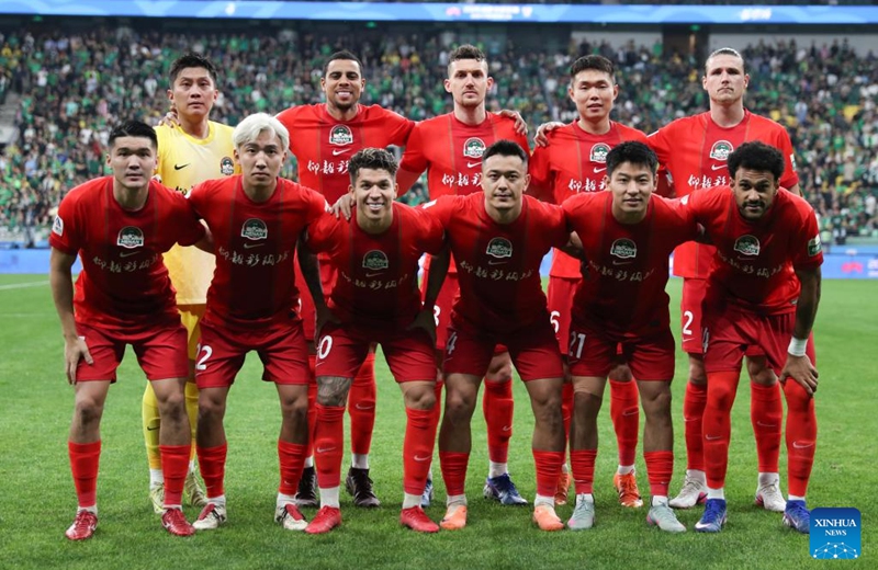Starters of Henan FC pose before the 14th round match between Beijing Guoan and Henan FC at the 2026 season Chinese Football Super League (CSL) in Beijing, capital of China, May 23, 2026. (Photo by Ma Zihan/Xinhua)