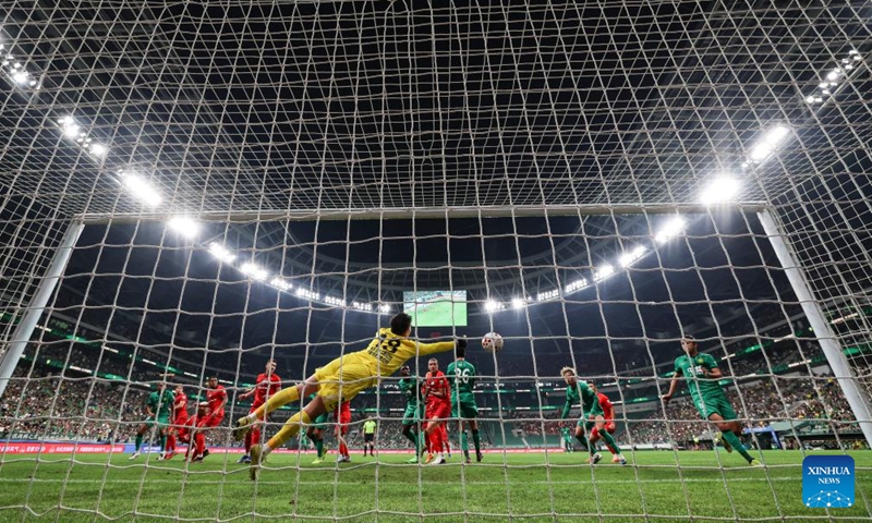 Dawhan (1st L) of Beijing Guoan heads to score during the 14th round match between Beijing Guoan and Henan FC at the 2026 season Chinese Football Super League (CSL) in Beijing, capital of China, May 23, 2026. (Xinhua/Hu Xingyu)