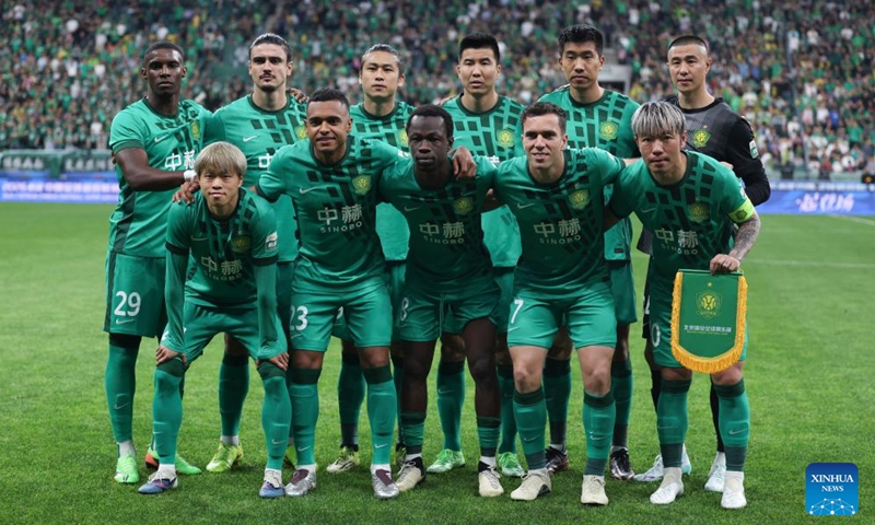 Starters of Beijing Guoan pose before the 14th round match between Beijing Guoan and Henan FC at the 2026 season Chinese Football Super League (CSL) in Beijing, capital of China, May 23, 2026. (Xinhua/Hu Xingyu)