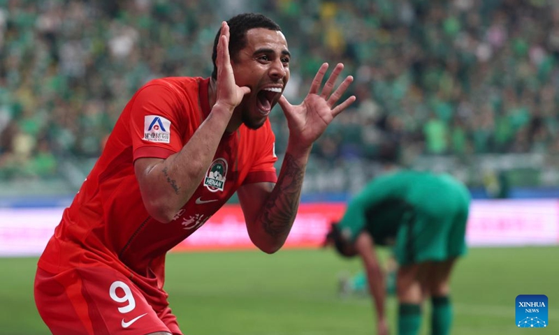 Gustavo of Henan FC celebrates a goal during the 14th round match between Beijing Guoan and Henan FC at the 2026 season Chinese Football Super League (CSL) in Beijing, capital of China, May 23, 2026. (Xinhua/Hu Xingyu)