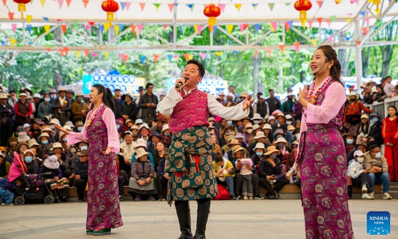 This photo taken on May 22, 2026 shows a scene of an event marking the 75th anniversary of the peaceful liberation of Xizang in Lhasa, southwest China's Xizang Autonomous Region. Xizang marks the 75th anniversary of its peaceful liberation on Saturday. People here celebrated with singing and dancing, praising a better life. (Xinhua/Tenzin Nyida)