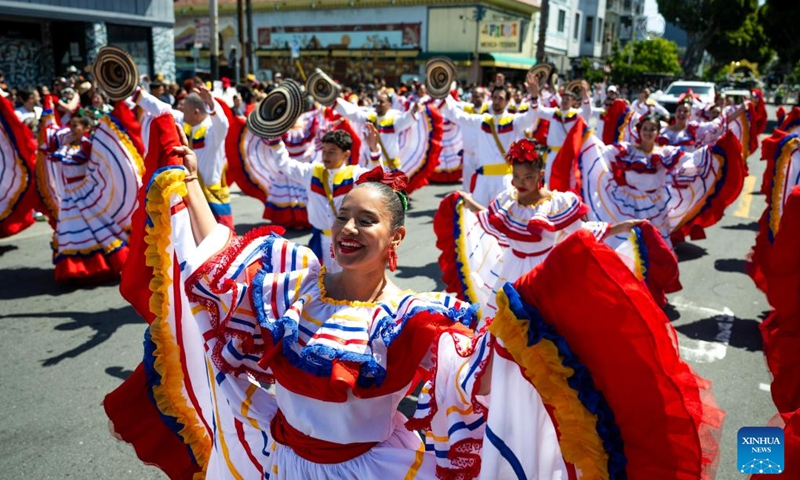 Artists perform in a parade during the Carnaval San Francisco in San Francisco, the United States, May 24, 2026. (Photo by Ziyu Julian Zhu/Xinhua)