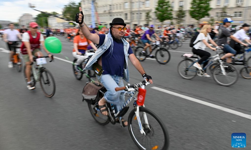 People ride bicycles during a spring bicycle festival in Moscow, Russia, May 24, 2026. The spring bicycle festival aimed to promote an eco-friendly and healthy lifestyle. (Photo by Alexander Zemlianichenko Jr/Xinhua)