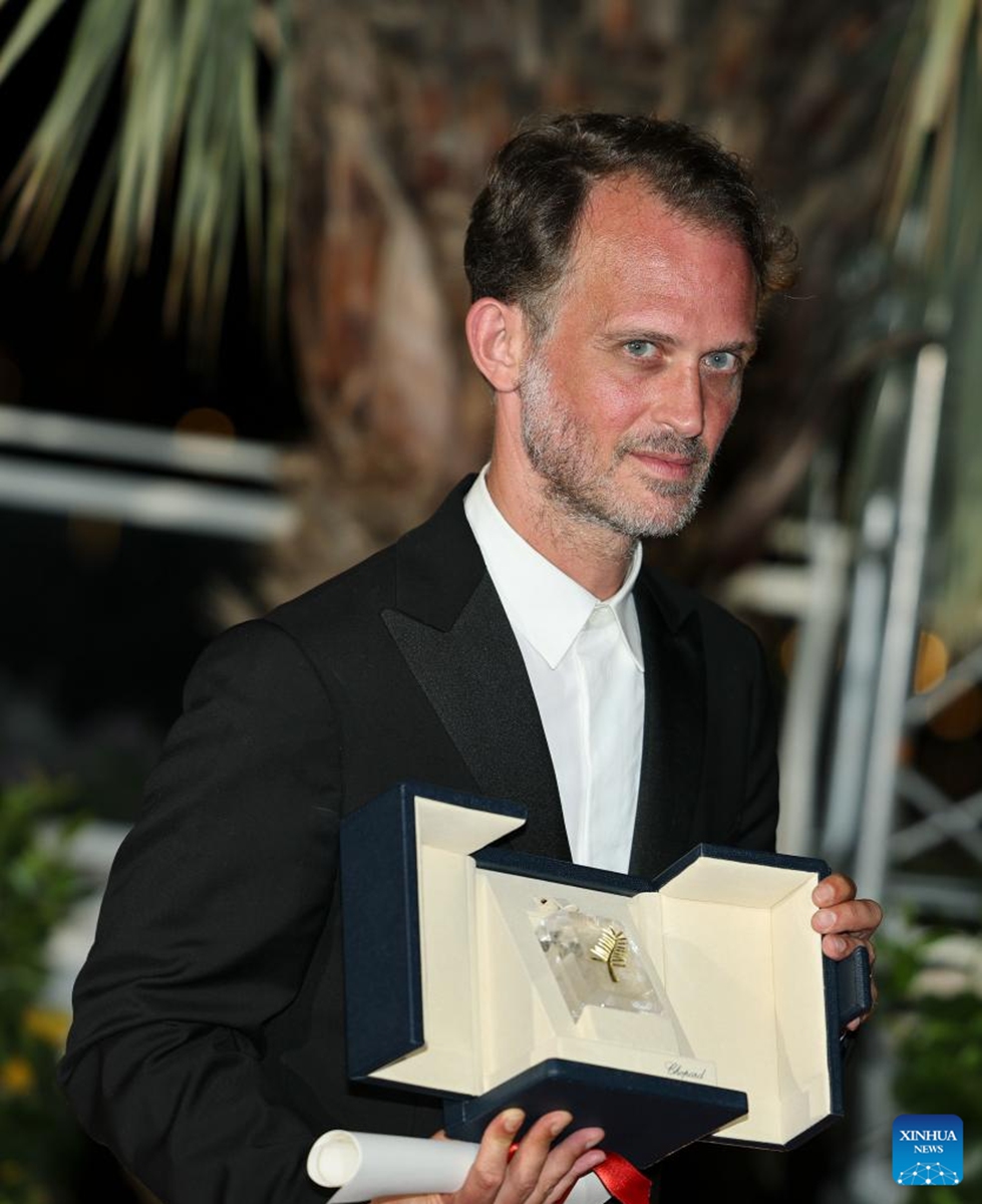 French director and screenwriter Emmanuel Marre poses during a photocall after receiving the Best Screenplay Award for A Man of His Time during the closing ceremony of the 79th edition of the Cannes Film Festival in Cannes, southern France, on May 23, 2026. The 79th edition of the Cannes Film Festival closed Saturday in the southern French resort town of Cannes. (Xinhua/Wu Huiwo)