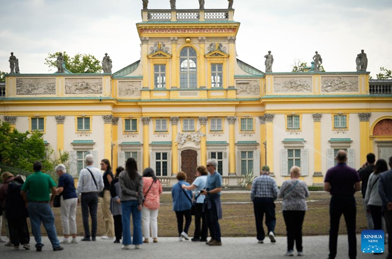 Visitors are seen at the main courtyard of Wilanow Palace in Warsaw, Poland, on May 23, 2026. The palace courtyard was officially opened to the public free of charge starting Saturday. (Photo by Jaap Arriens/Xinhua)