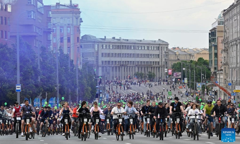 People ride bicycles during a spring bicycle festival in Moscow, Russia, May 24, 2026. The spring bicycle festival aimed to promote an eco-friendly and healthy lifestyle. (Photo by Alexander Zemlianichenko Jr/Xinhua)