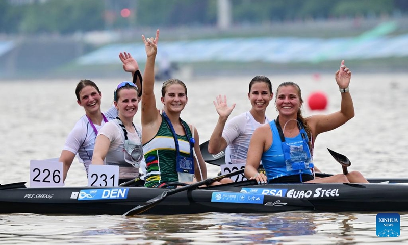 Panna Csepe (2nd R) of Hungary, Pernille Kuijers Hostrup (2nd L) of Denmark and Katerrina Milova (1st R) of the Czech Republic react after the K1 women seniors 19km final at the 2026 Canoe Marathon World Cup in Bazhong, southwest China's Sichuan Province, May 24, 2026. (Photo by Zhou Min/Xinhua)