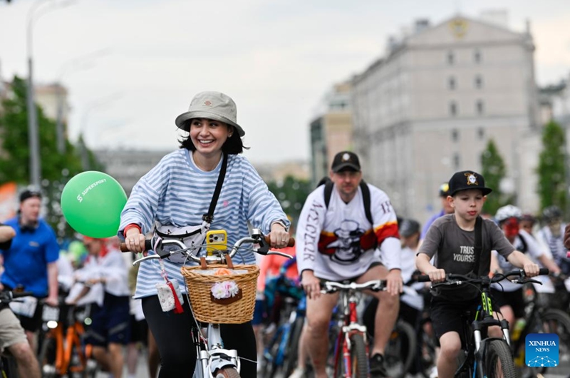 People ride bicycles during a spring bicycle festival in Moscow, Russia, May 24, 2026. The spring bicycle festival aimed to promote an eco-friendly and healthy lifestyle. (Photo by Alexander Zemlianichenko Jr/Xinhua)