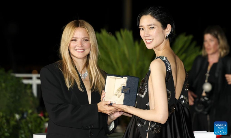 Virginie Efira (L) and Tao Okamoto pose during a photocall after winning the Best Actress Award for their performances in Suddenly during the closing ceremony of the 79th edition of the Cannes Film Festival in Cannes, southern France, on May 23, 2026. The 79th edition of the Cannes Film Festival closed Saturday in the southern French resort town of Cannes. (Xinhua/Wu Huiwo)
