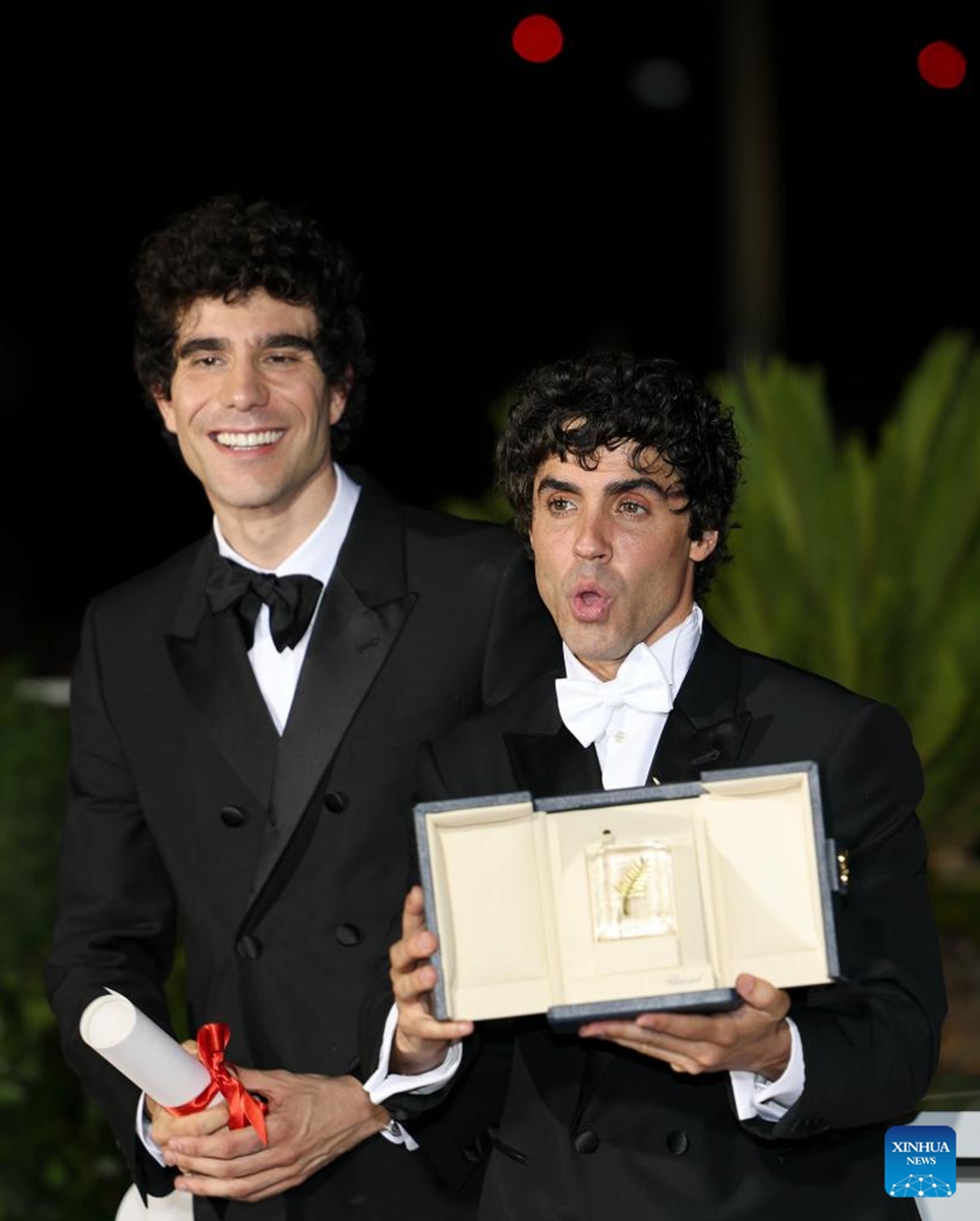 Javier Calvo (L) and Javier Ambrossi pose during a photocall after winning the Best Director Award for La Bola Negra during the closing ceremony of the 79th edition of the Cannes Film Festival in Cannes, southern France, on May 23, 2026. The 79th edition of the Cannes Film Festival closed Saturday in the southern French resort town of Cannes. (Xinhua/Wu Huiwo)