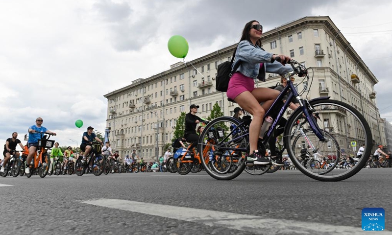 People ride bicycles during a spring bicycle festival in Moscow, Russia, May 24, 2026. The spring bicycle festival aimed to promote an eco-friendly and healthy lifestyle. (Photo by Alexander Zemlianichenko Jr/Xinhua)