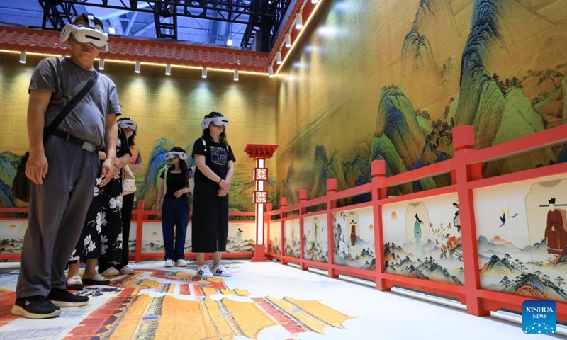 Visitors are pictured during a VR immersive experience at the 22nd China (Shenzhen) International Cultural Industries Fair in Shenzhen, south China's Guangdong Province, May 22, 2026. The 22nd China (Shenzhen) International Cultural Industries Fair kicked off on Thursday in the metropolis of Shenzhen.
The five-day event, which highlights cultural industry development, focuses on the digital intelligence empowerment of the industry and the cultivation of new quality productive forces, gathering domestic and foreign high-end cultural industry resources and innovation elements. Photo: Xinhua