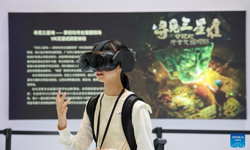 A visitor is pictured during a VR immersive experience at the 22nd China (Shenzhen) International Cultural Industries Fair in Shenzhen, south China's Guangdong Province, May 24, 2026. The 22nd China (Shenzhen) International Cultural Industries Fair kicked off on Thursday in the metropolis of Shenzhen.
The five-day event, which highlights cultural industry development, focuses on the digital intelligence empowerment of the industry and the cultivation of new quality productive forces, gathering domestic and foreign high-end cultural industry resources and innovation elements. Photo: Xinhua