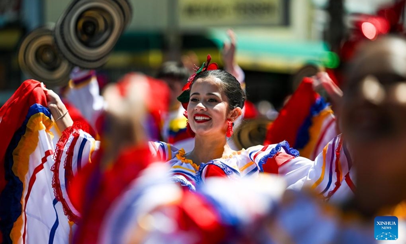 Artists perform in a parade during the Carnaval San Francisco in San Francisco, the United States, May 24, 2026. (Photo by Ziyu Julian Zhu/Xinhua)