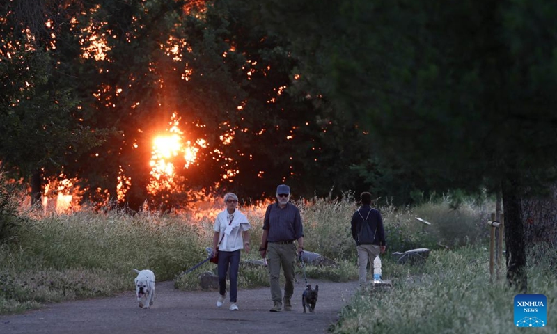People walk at the Park of the Aqueducts in Rome, Italy, May 23, 2026. (Xinhua/Li Jing)