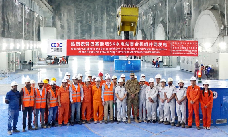 Chinese and Pakistani engineers celebrate the connecting of the first unit of the Chinese-built Suki Kinari Hydropower project to the grid for power generation in northwest Pakistan's Mansehra on Aug. 12, 2024. (China Energy Construction Overseas Investment Co., Ltd./Handout via Xinhua)