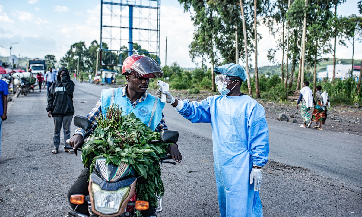 A health worker conducts temperature screenings and health checks on a traveler at a checkpoint in Goma, Democratic Republic of Congo, on May 24, 2026. World Health Organization (WHO) Director-General Tedros Adhanom Ghebreyesus said on Monday that the fast-moving Ebola outbreak in Democratic Republic of Congo and Uganda was outpacing response efforts, according to Reuters. Photo: VCG