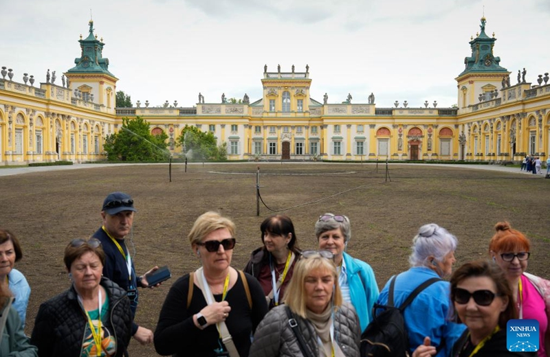 Visitors are seen at the main courtyard of Wilanow Palace in Warsaw, Poland, on May 23, 2026. The palace courtyard was officially opened to the public free of charge starting Saturday. (Photo by Jaap Arriens/Xinhua)