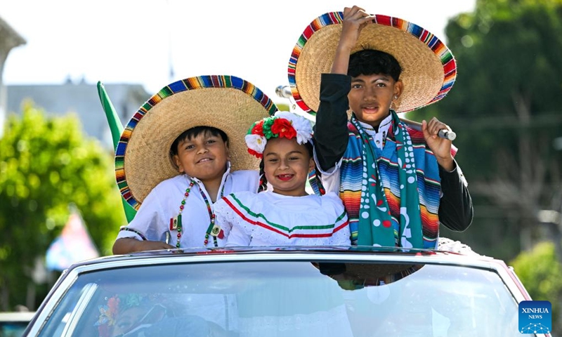 People attend a parade during the Carnaval San Francisco in San Francisco, the United States, May 24, 2026. (Photo by Ziyu Julian Zhu/Xinhua)