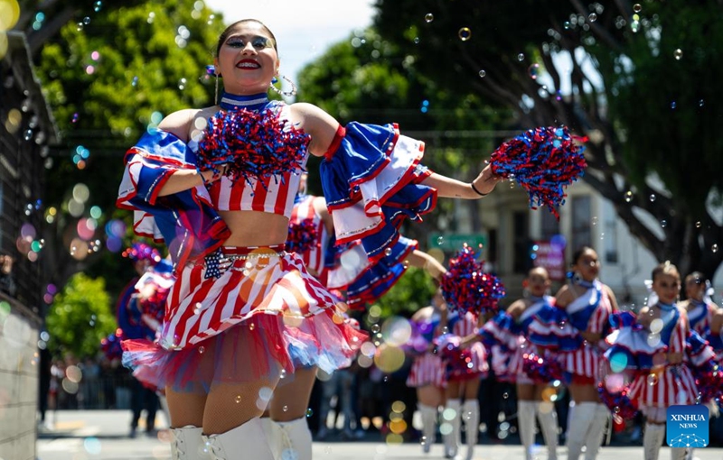 Artists perform in a parade during the Carnaval San Francisco in San Francisco, the United States, May 24, 2026. (Photo by Ziyu Julian Zhu/Xinhua)