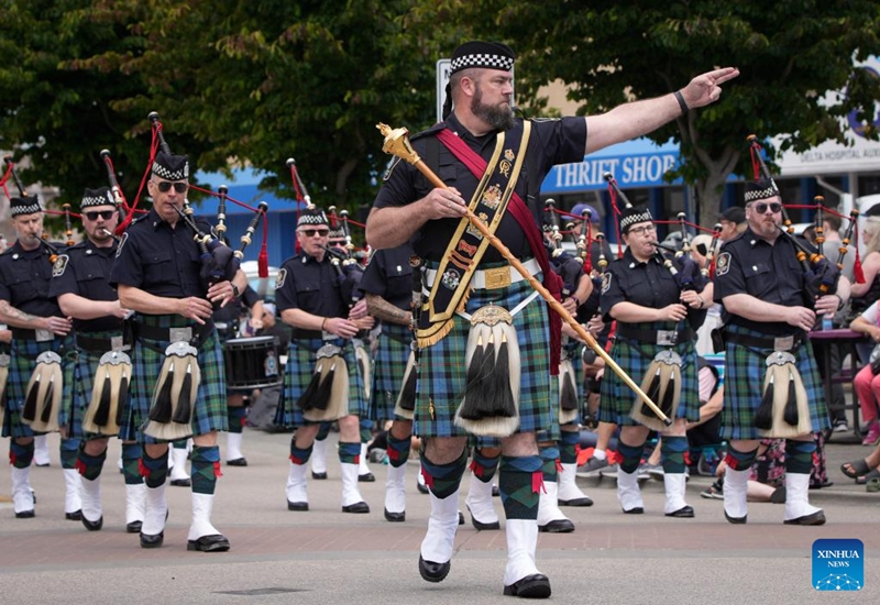 A marching band performs during the Ladner May Days parade in Ladner, British Columbia, Canada, May 24, 2026. (Photo by Liang Sen/Xinhua)