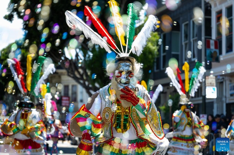 Artists perform in a parade during the Carnaval San Francisco in San Francisco, the United States, May 24, 2026. (Photo by Ziyu Julian Zhu/Xinhua)