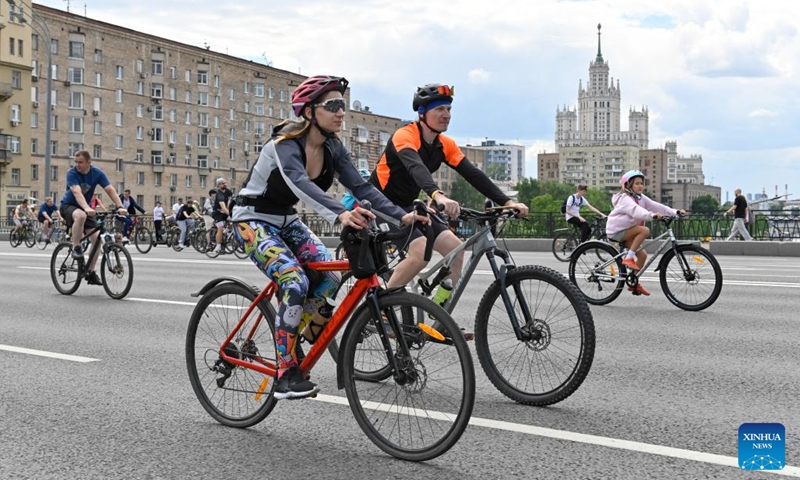 People ride bicycles during a spring bicycle festival in Moscow, Russia, May 24, 2026. The spring bicycle festival aimed to promote an eco-friendly and healthy lifestyle. (Photo by Alexander Zemlianichenko Jr/Xinhua)