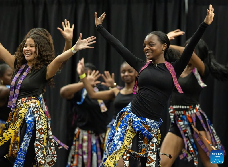 Performers dance during the 2026 Carassauga Festival of Cultures in Mississauga, Ontario, Canada, May 23, 2026. The two-day annual cultural event kicked off here on Saturday, featuring diverse cuisine, stage shows and interactive experiences. (Photo by Zou Zheng/Xinhua)