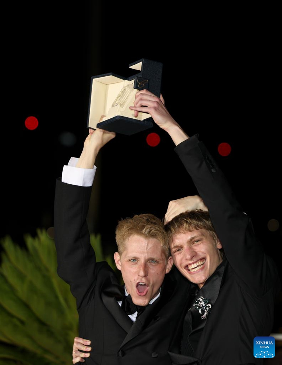 Valentin Campagne (L) and Emmanuel Macchia pose during a photocall after winning the Best Actor Award for their roles in Coward during the closing ceremony of the 79th edition of the Cannes Film Festival in Cannes, southern France, on May 23, 2026. The 79th edition of the Cannes Film Festival closed Saturday in the southern French resort town of Cannes. (Xinhua/Wu Huiwo)