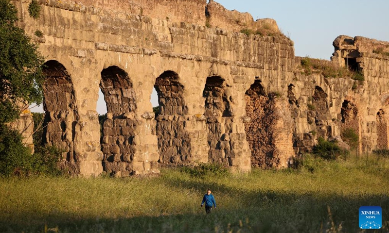 A man walks at the Park of the Aqueducts in Rome, Italy, May 24, 2026. (Xinhua/Li Jing)