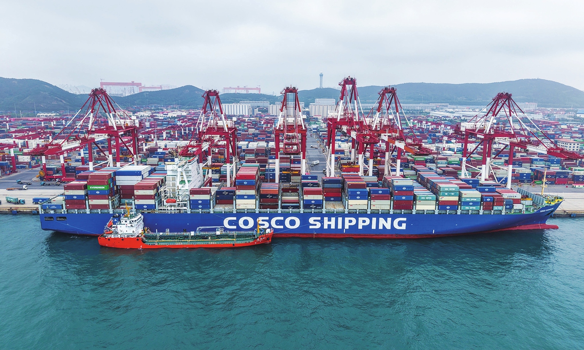 A container ship docks at the Qingdao Port, East China's Shandong Province, on May 25, 2026. Photo: VCG