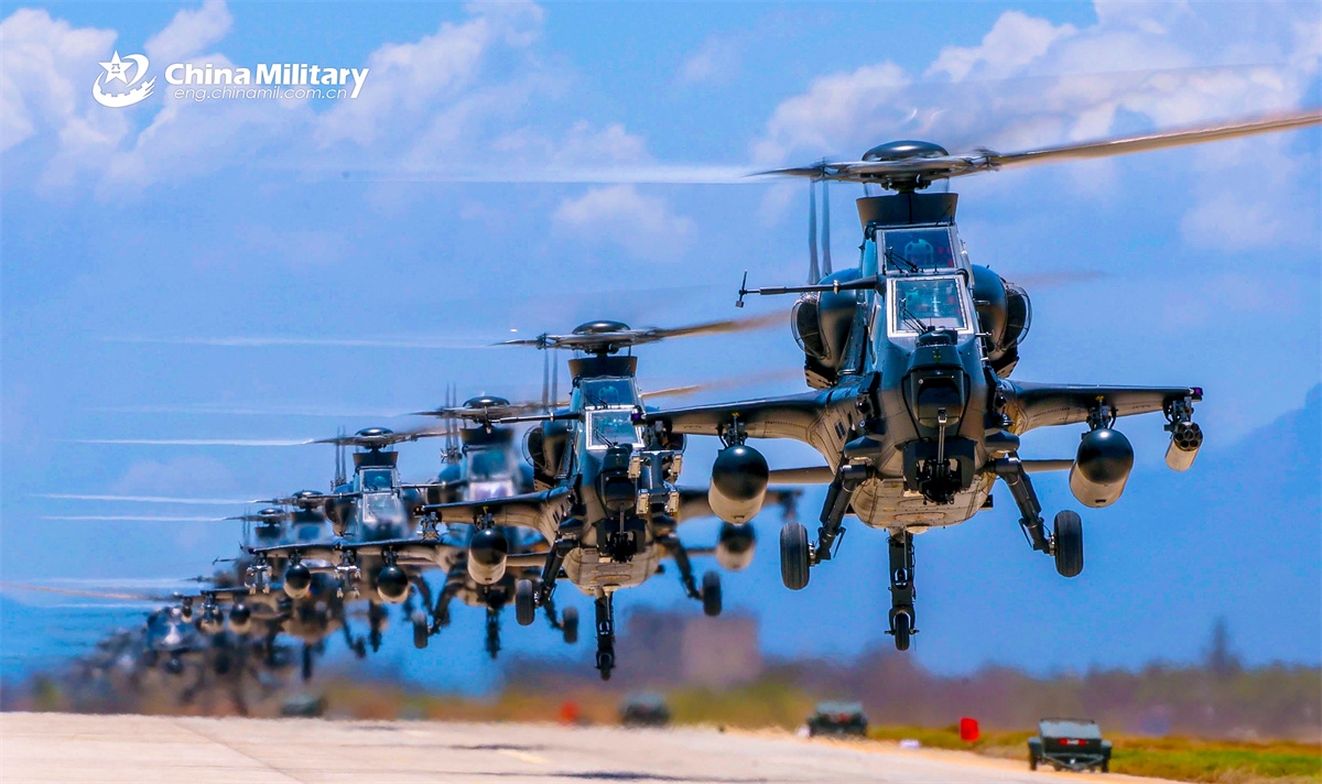 Z-10 attack helicopters attached to a brigade under the Chinese PLA 73rd Group Army hover at an ultra-low altitude during a training exercise on May 14, 2026. (Photo: eng.chinamil.com.cn)