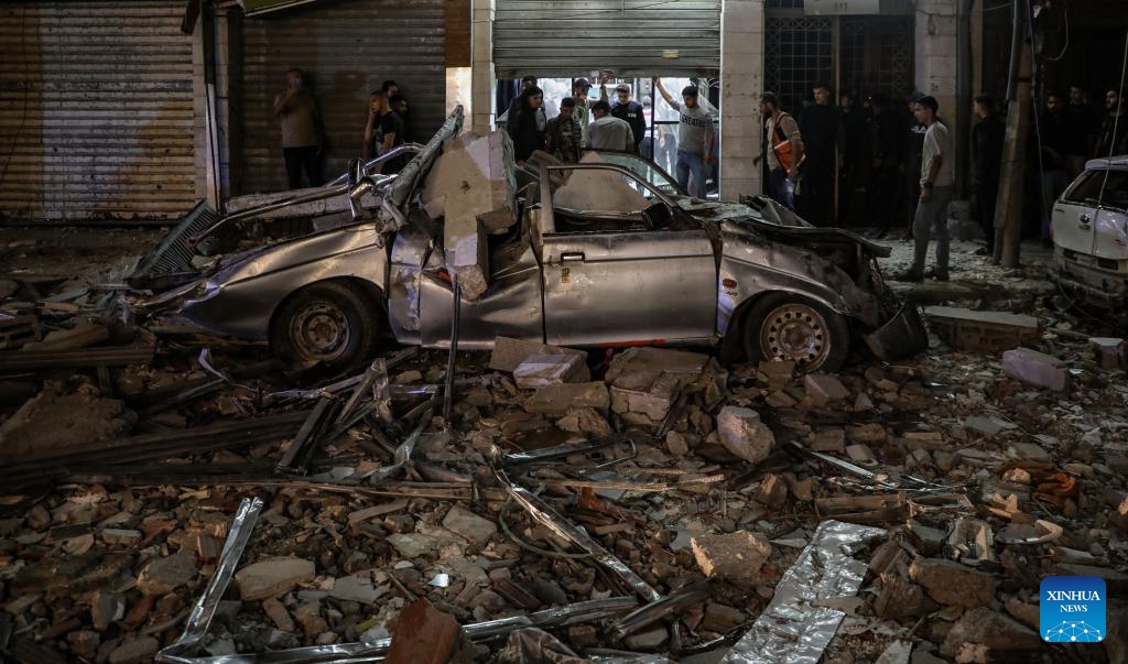 Palestinians inspect the aftermath of an Israeli bombing that targeted a residential building in the center of Gaza City, on May 26, 2026. (Photo: Xinhua)