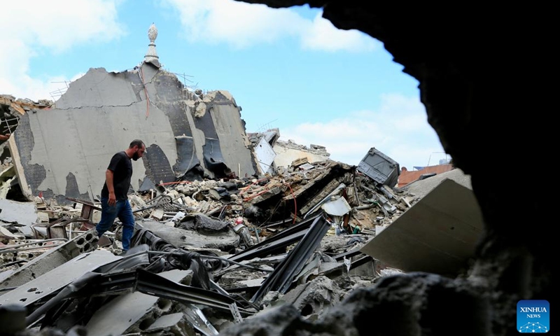 This photo taken on May 26, 2026 shows a citizen inspecting his house destroyed by an Israeli airstrike in Tyre, Lebanon. Israeli strikes on southern and eastern Lebanon killed at least 18 people and wounded more than 20 others on Tuesday, according to Lebanon's official sources, as Israel intensified its bombardment campaign across southern Lebanon. (Photo: Xinhua)