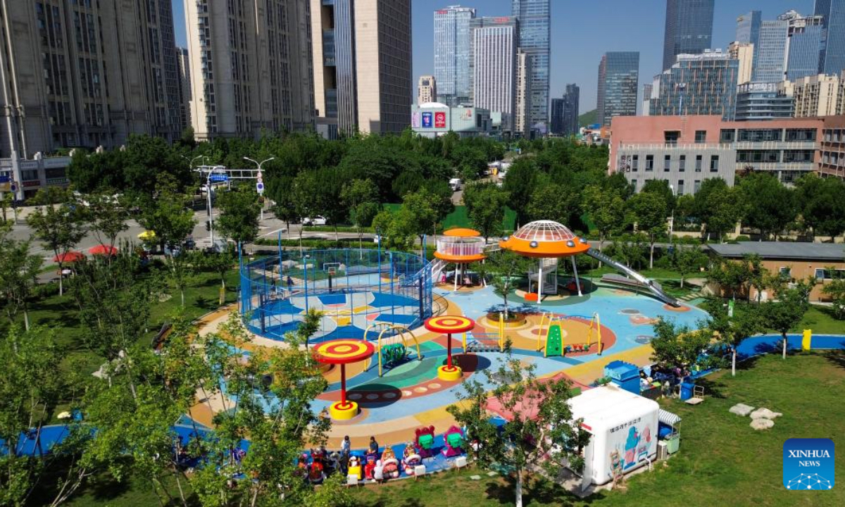 An aerial drone photo taken on May 28, 2026 shows a child-friendly park in Jinan, east China's Shandong Province. In recent years, Jinan has built more than 30 child-friendly parks to support the healthy growth of children. (Xinhua/Xu Suhui)