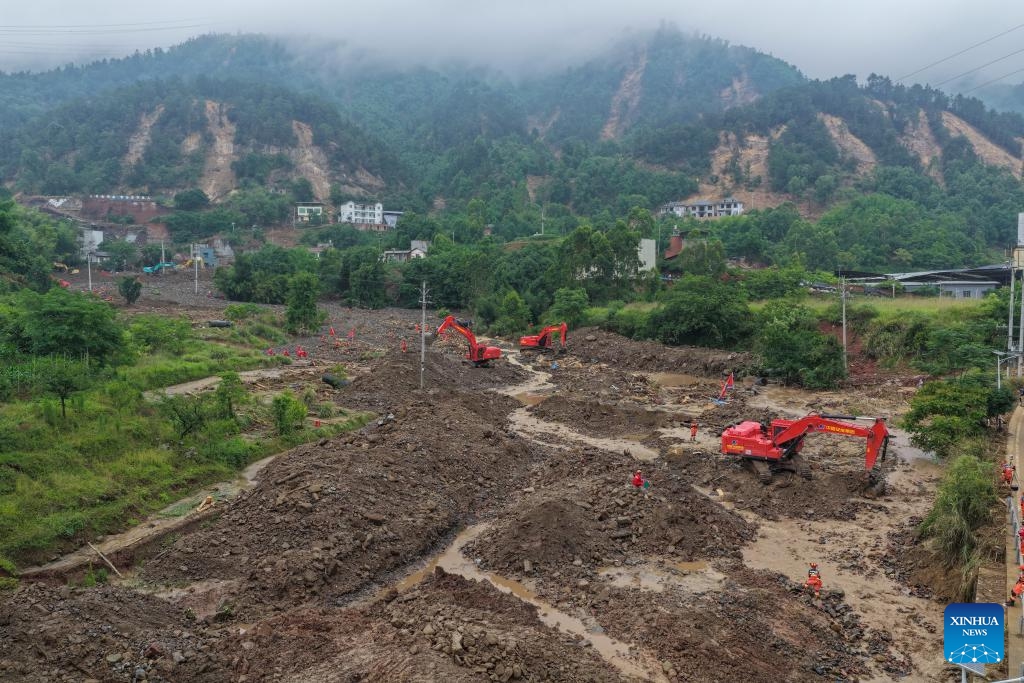 An aerial drone photo taken on May 25, 2026 shows the rescue site of the flood-hit area after a heavy rainstorm hit Yongchuan District in southwest China's Chongqing Municipality. Record-breaking torrential rain battered Yongchuan District in southwest China's Chongqing Municipality from late Saturday to Sunday, triggering flash floods, landslides and mudslides. Rescue operations are still underway as multiple towns and subdistricts suffered severe damage. (Photo: Xinhua)