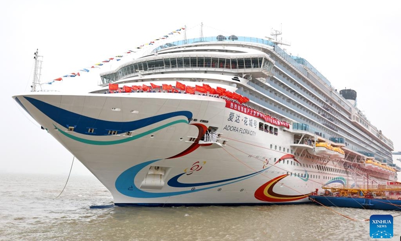 Cruise ship Adora Flora City berths at a port in east China's Shanghai, May 27, 2026. China's second domestically built large cruise ship, the Adora Flora City, returned to port in Shanghai on Wednesday after completing a 12-day maiden sea trial, marking a milestone in the country's push to mass-produce large cruise ships. The ship is scheduled for delivery on November 6 and will operate international routes from the Nansha International Cruise Home Port in Guangzhou, capital of south China's Guangdong Province. (Photo: Xinhua)
