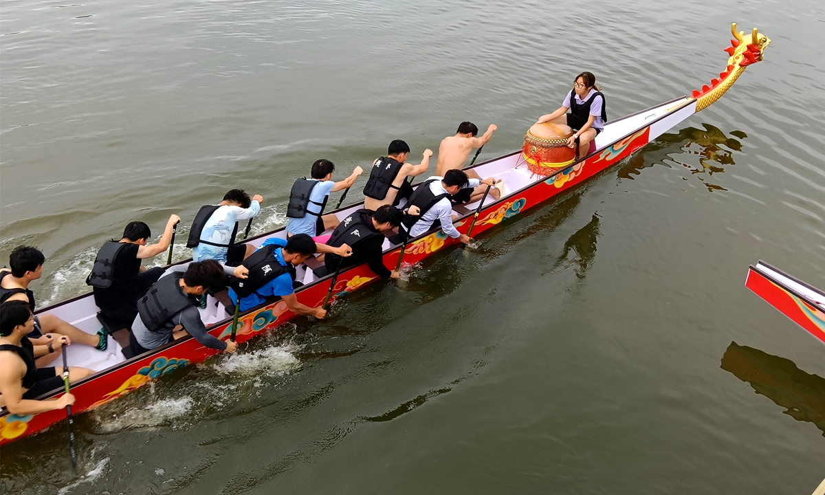 Ahead of a contest, a dragon boat team practices in Yichang, Central China's Hubei Province, on May 26, 2026. Teams from 12 universities from across the country will participate in the tournament to be held from May 30 to June 20. Photo: VCG