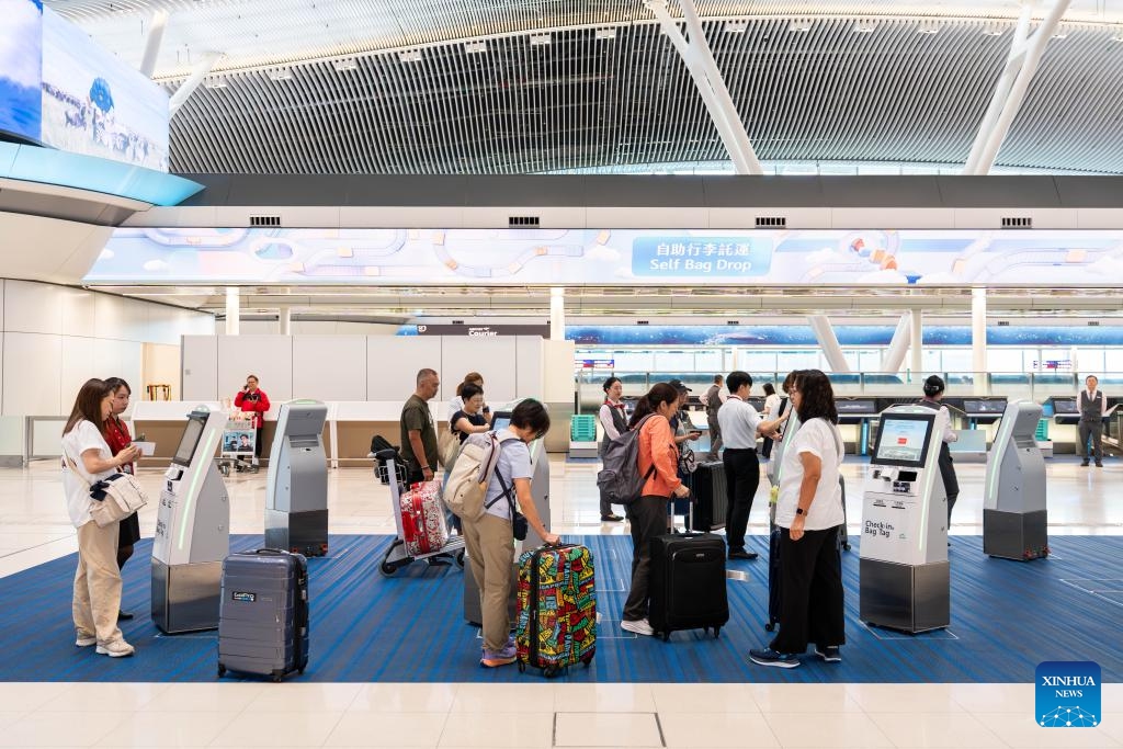 Passengers check in at the departures hall of Terminal 2 of Hong Kong International Airport in south China's Hong Kong, on May 27, 2026. Hong Kong International Airport's expanded Terminal 2 departures hall was officially put into operation on Wednesday following a 12.9 billion-Hong Kong-dollar upgrade. (Photo: Xinhua)