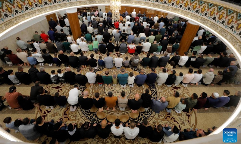 Palestinians offer Eid al-Adha prayers at Al-Hussein Mosque in the West Bank city of Hebron, May 27, 2026. (Photo: Xinhua)