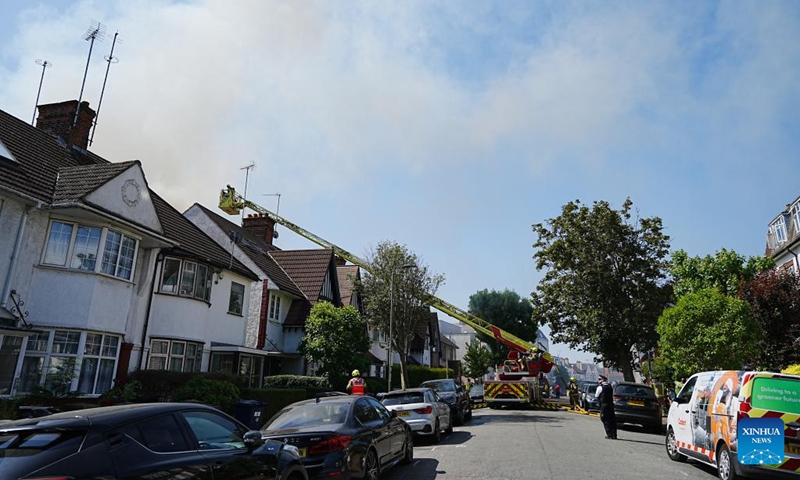 Firefighters work after a fire broke out at a supermarket in Golders Green, London, Britain, May 27, 2026. A large fire broke out at a supermarket early Wednesday in Golders Green, an area in northwest London known for its large Jewish community, prompting a major emergency response and road closures, according to the London Fire Brigade. (Photo: Xinhua)