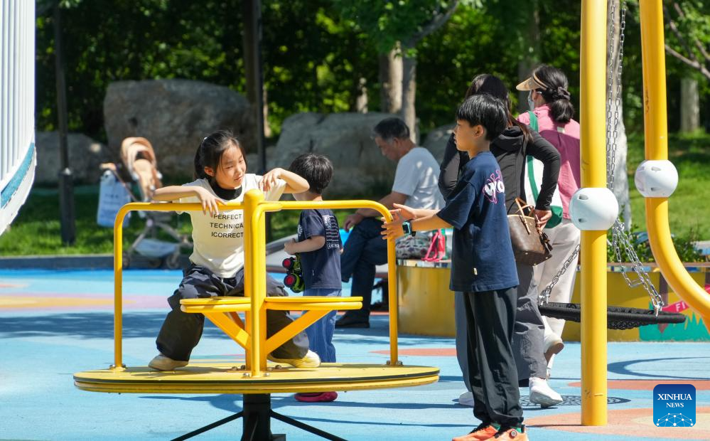 Kids play at a child-friendly park in Jinan, east China's Shandong Province, May 28, 2026. In recent years, Jinan has built more than 30 child-friendly parks to support the healthy growth of children. (Xinhua/Xu Suhui)