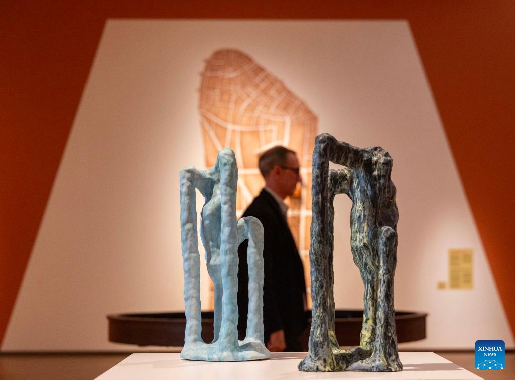 A man walks past artworks during the media preview of the International Ceramic Art Fair 2026 at the Gardiner Museum in Toronto, Canada, May 27, 2026. Featuring innovations and contemporary trends in ceramic art, this biennial exhibition opens to the public from May 28 to August 16. (Photo: Xinhua)