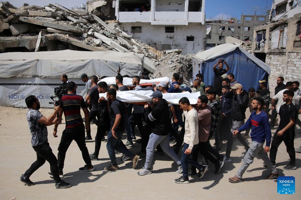 People attend the funeral of Mohammed Odeh and his family members who were killed in an Israeli airstrike, in Gaza City, on May 27, 2026. Hamas on Wednesday officially confirmed that Mohammed Odeh, the newly-appointed commander-in-chief of the group's armed wing, the Al-Qassam Brigades, was killed in an Israeli airstrike on Tuesday evening. (Photo: Xinhua)