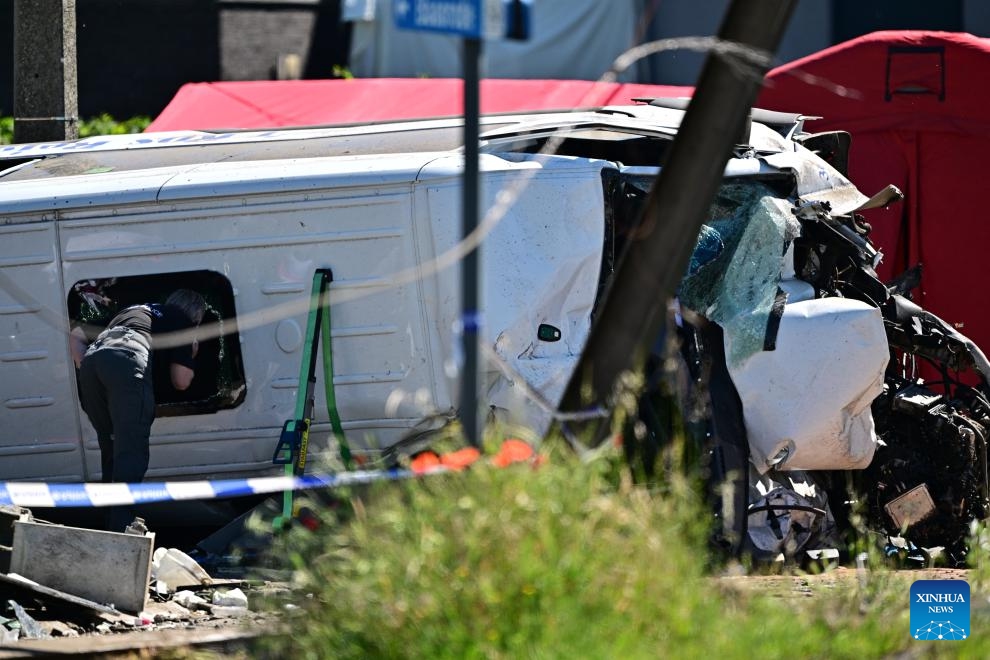 This photo taken on May 26, 2026 shows a scene of a school bus crash in Buggenhout, East Flanders, Belgium. Several people were killed on Tuesday morning after a school bus was hit by a train at a level crossing in Buggenhout, East Flanders, according to local media reports. (Photo: Xinhua)