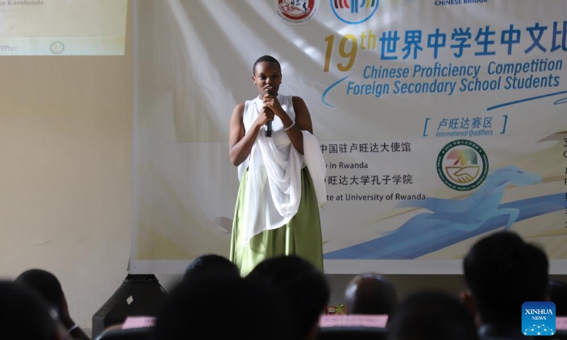 Gwiza Sabrina, the winner of Rwandan final of the 2026 Chinese Bridge Chinese Proficiency Competition for Foreign Secondary School Students, delivers a speech during the competition in Kigali, Rwanda, May 24, 2026. (Photo: Xinhua)


